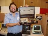 The ever zany Hans Franke shows off a briefcase computer of some sort.